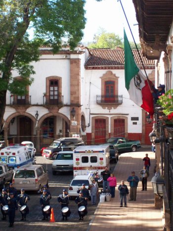 Hotel Los Escudos view from balcony of a flag raising ceremony, Patzcuaro Plaza Principal, Michoacan