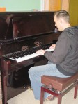 Andrew J. Wharton Playing Piano